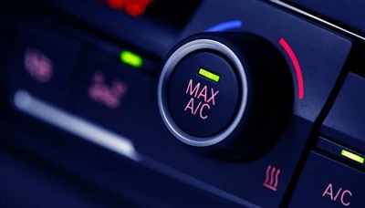 How often to add refrigerant to a car's air conditioning system varies